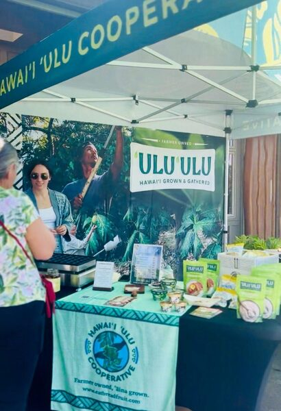 Hawaiʻi ʻUlu Cooperative tent at the Grow Hawaiian Celebration at Amy B.H. Greenwell Ethnobotanical Garden