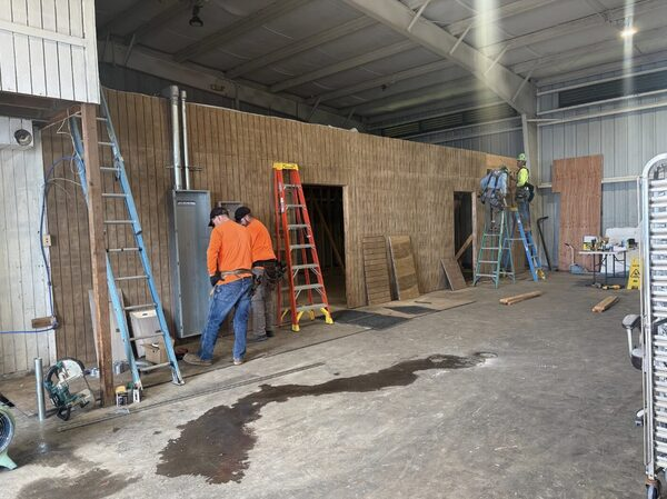 Construction crew working inside the Honalo Marshaling Yard during the facility upgrade